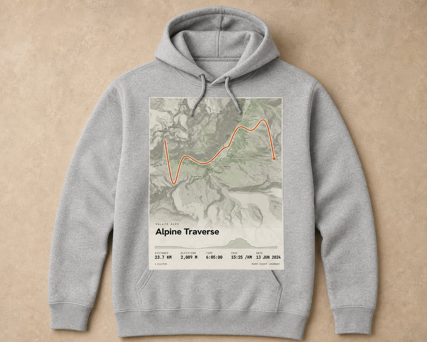 The Route Hoodie, a folded brushed-fleece hoodie with the route on a small chest badge